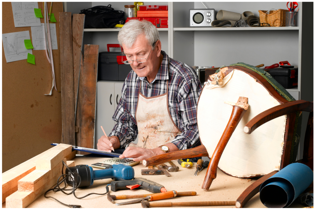 retired man refurbishing furniture